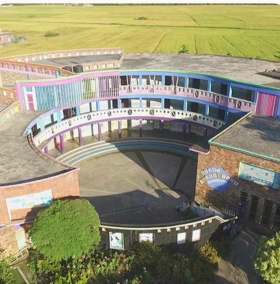 Aerial view of Kids' Foundation circular modern school campus